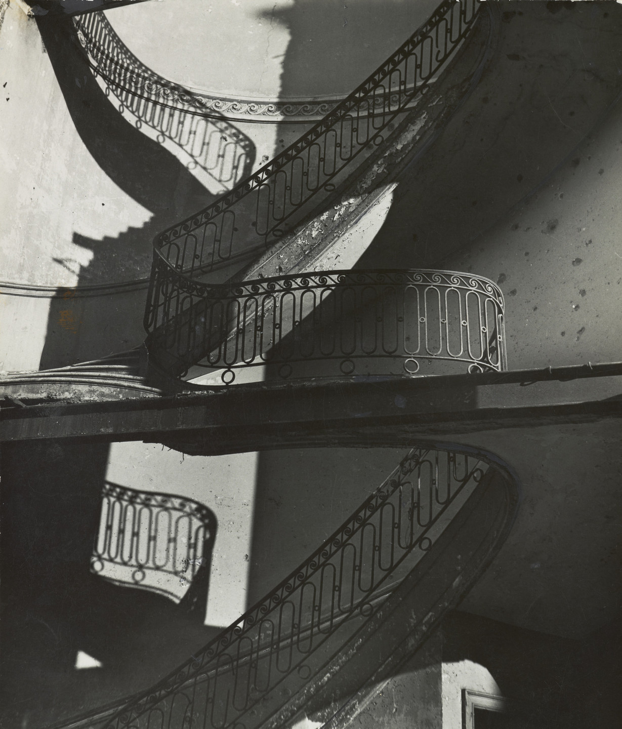 Bill Brandt. Bombed Regency Staircase, Upper Brook Street, Mayfair. c. 1942