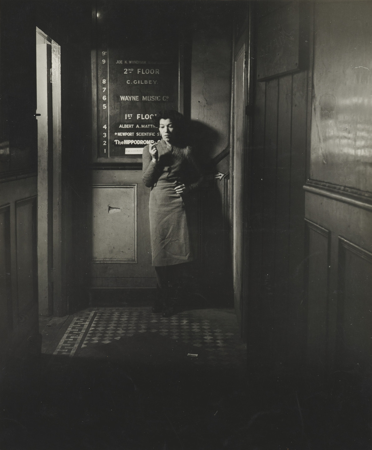 Bill Brandt. Outside a Soho Nightclub. 1942