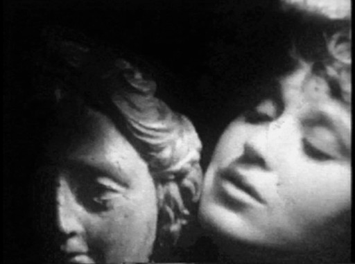 VALIE EXPORT. Self-Portrait with Head. 1967