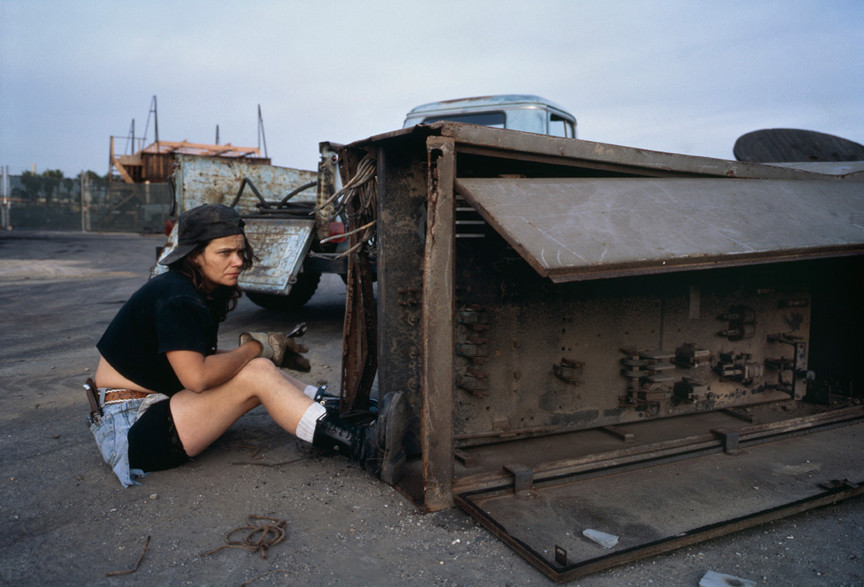 Allan Sekula. &#34;Pancake,&#34; a former shipyard sandblaster, scavenging copper from a waterfront scrapyard. Los Angeles harbor. Terminal Island, California from the series Fish Story. November 1992