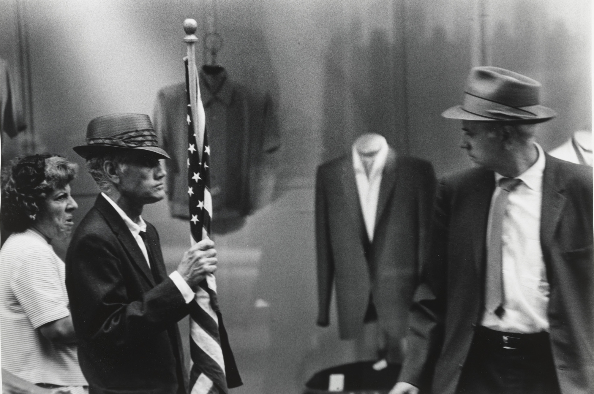 Beuford Smith. Man with Flag, Times Square, NYC. 1967