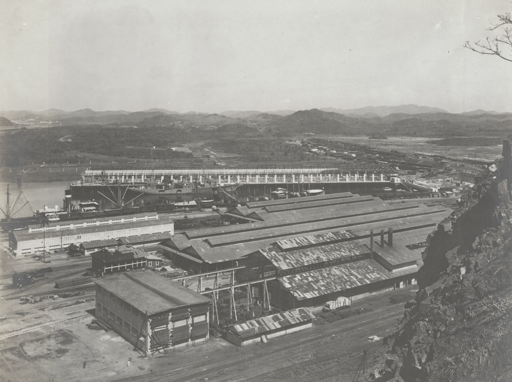 Balboa Terminals. Looking north from Sosa Hill. Concrete Walls in progress on pier No. 18. Buildings in foreground protected from blasting