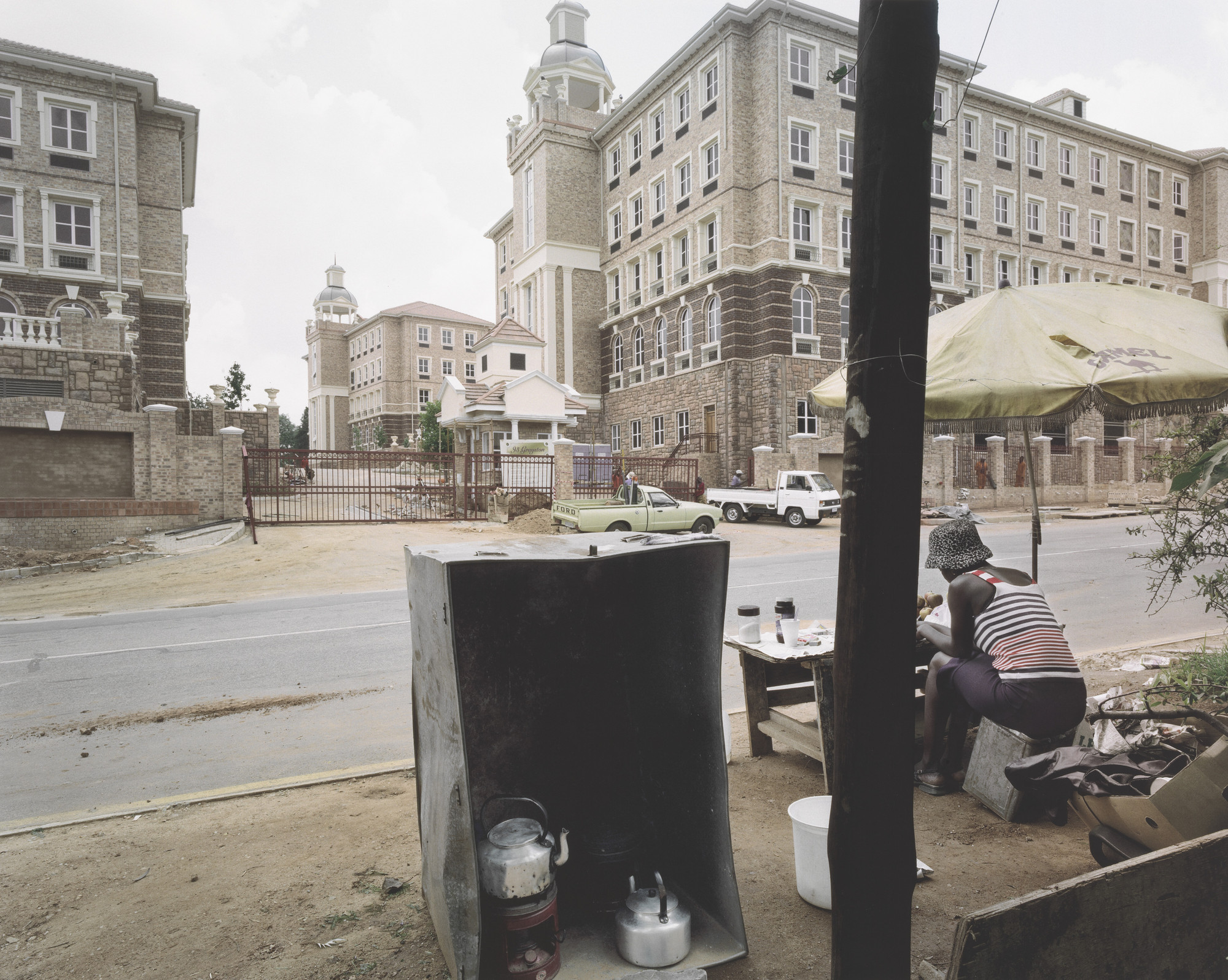 David Goldblatt. Street Trader Waiting to Sell Food to Construction Workers from 93 Grayston Office Park, Sandton
