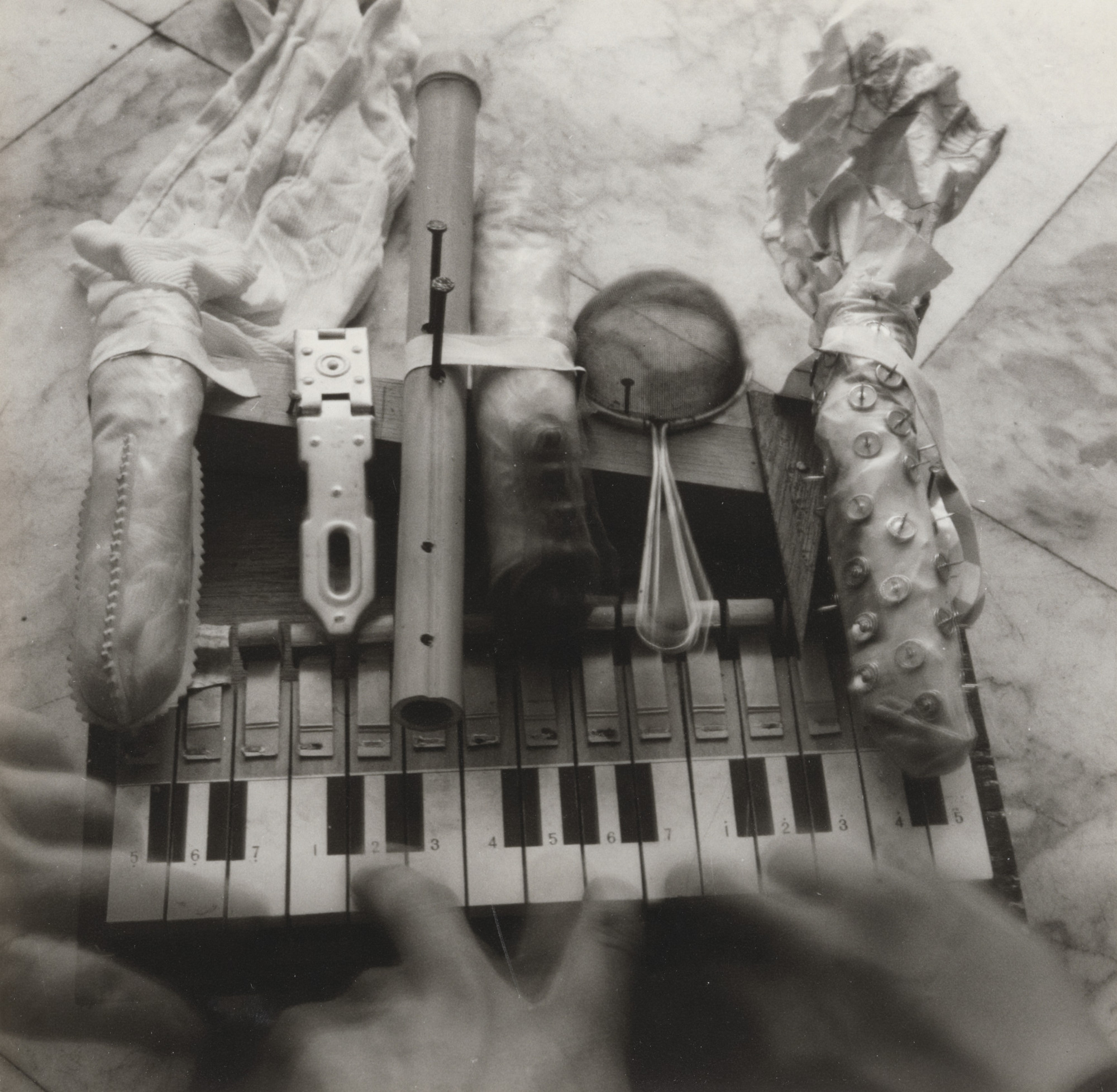 George Maciunas. Nam June Paik's prepared toy piano at his