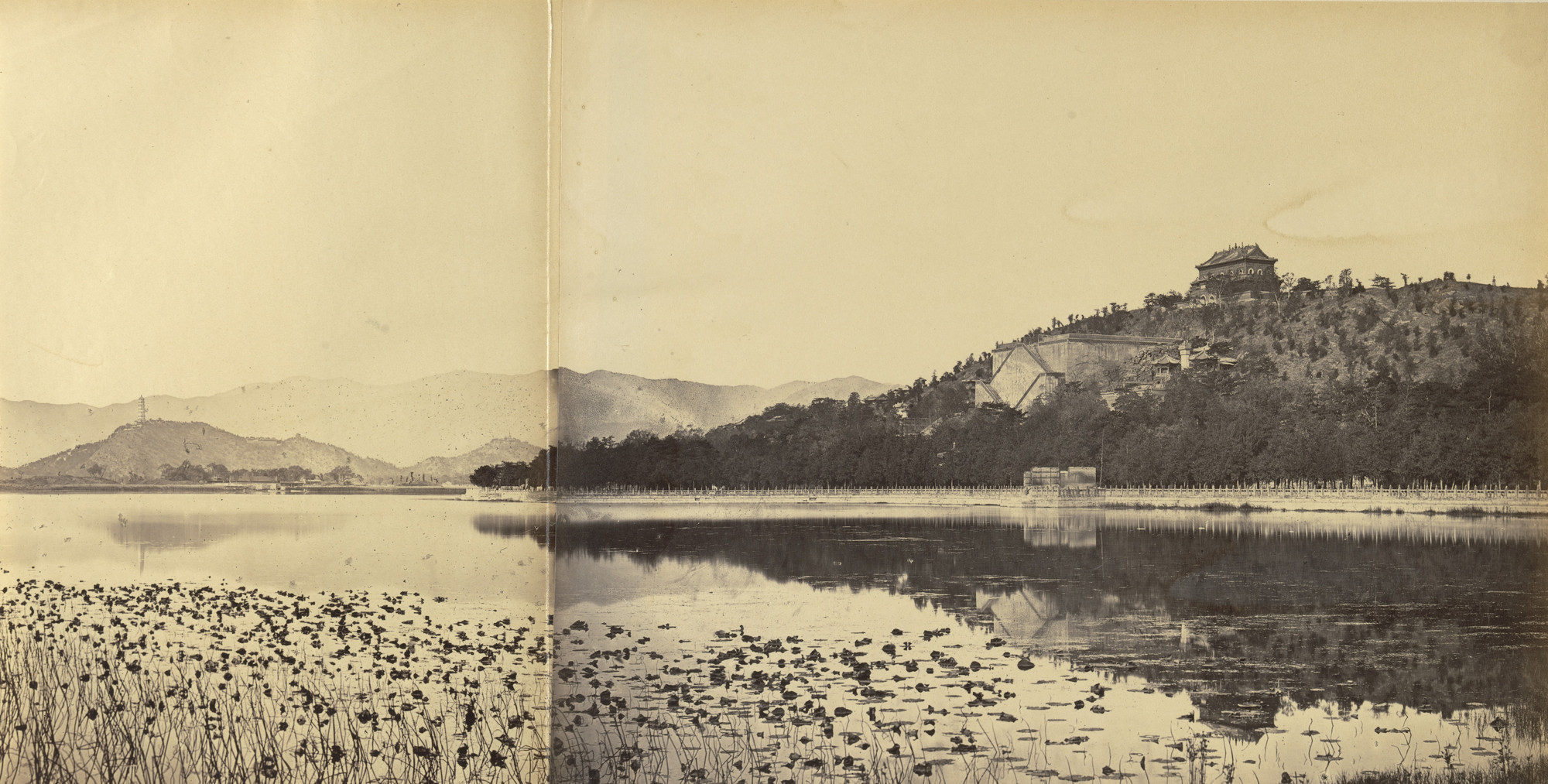 Felice Beato. View of the Imperial Summer Palace Yuen Ming Yuen After the Burning, Taken from the Lake, Peking. October 1860