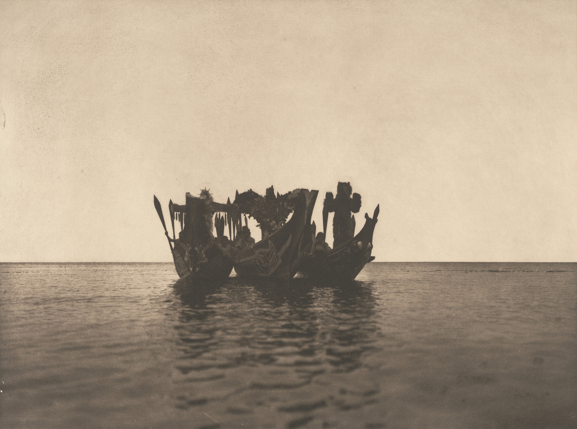 Edward Curtis. Masked Dancers in Canoes, Qagyuhi. 1914