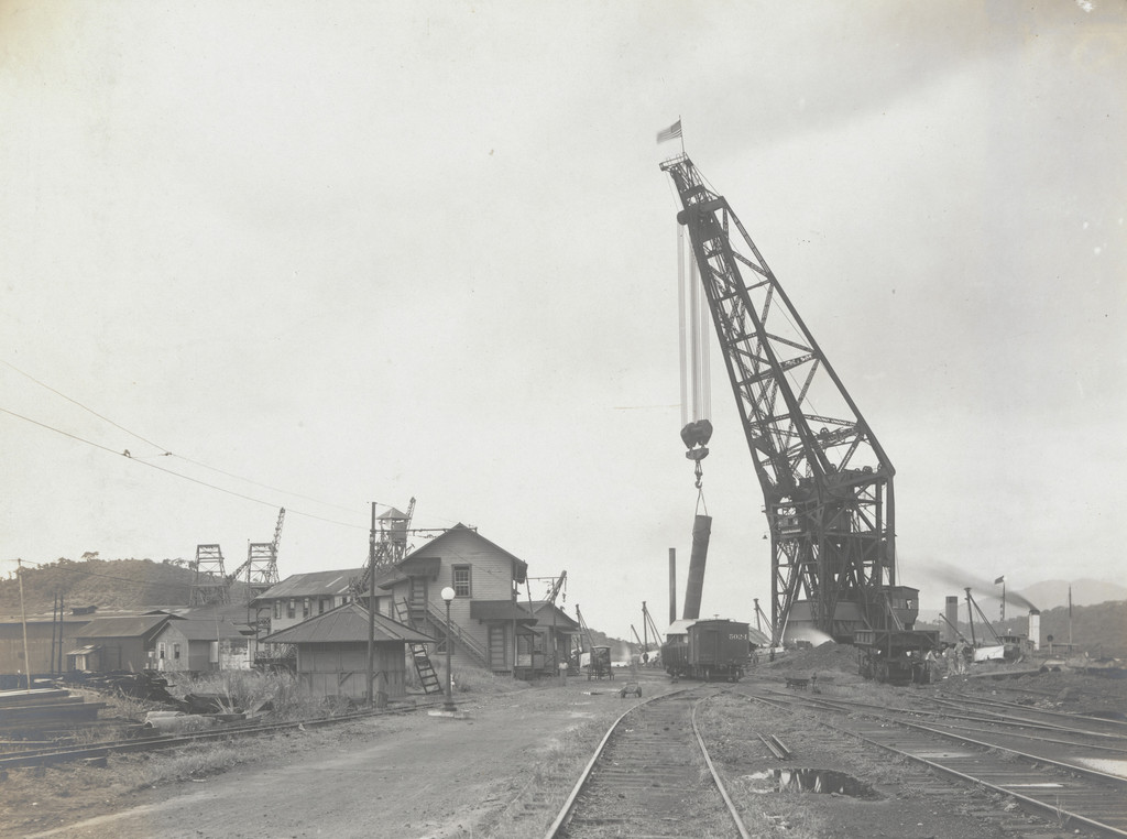 Floating crane "Hercules" pulling 6 ft caissons at reloader wharf coaling plant