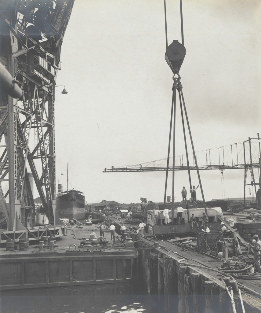 Floating crane "Ajax" showing method of attaching test load to the individual hooks