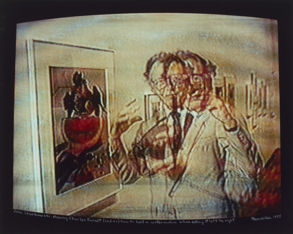 John Szarkowski showing Charles Kuralt (and us) how to hold a watermelon when eating it left to right