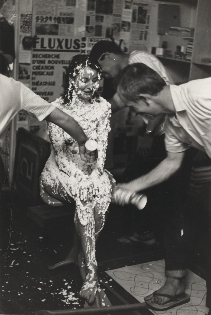 Lick Piece (1962), performed by Lette Eisenhauer during Fully Guaranteed 12 Fluxus Concerts, Canal Street, New York, May 9, 1964 by Benjamin Patterson, Peter Moore