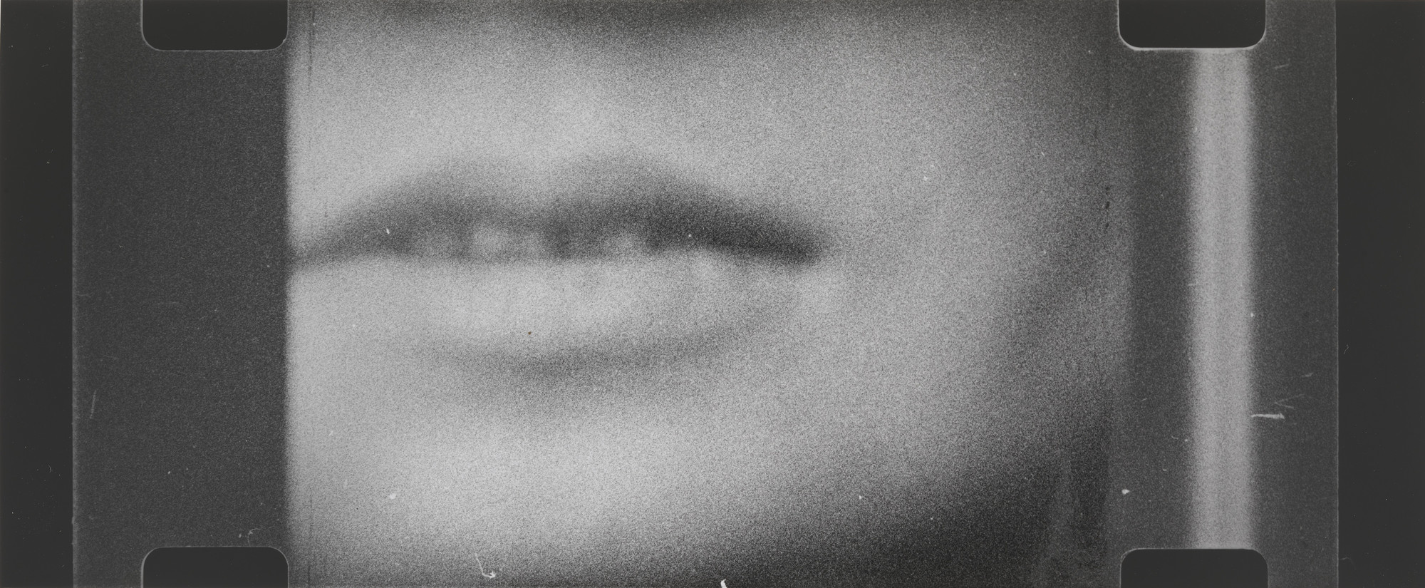 George Maciunas, Mieko Shiomi. Still from Disappearing Music for Face