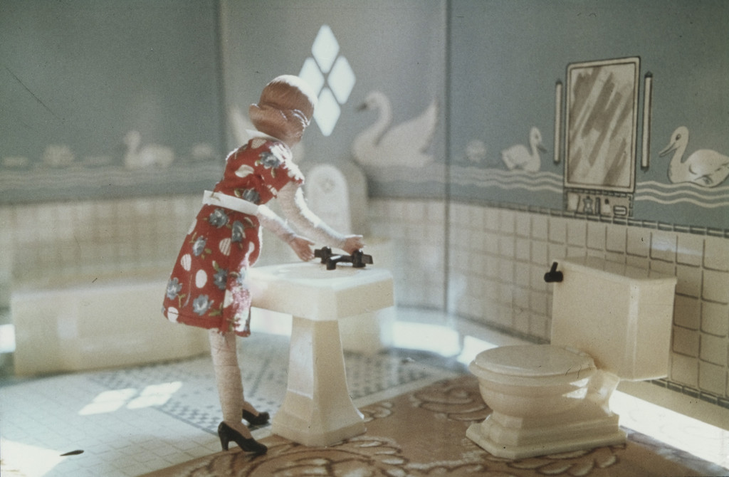 1st Bathroom/Woman Standing, from the series Interiors, Laurie Simmons, 1978
