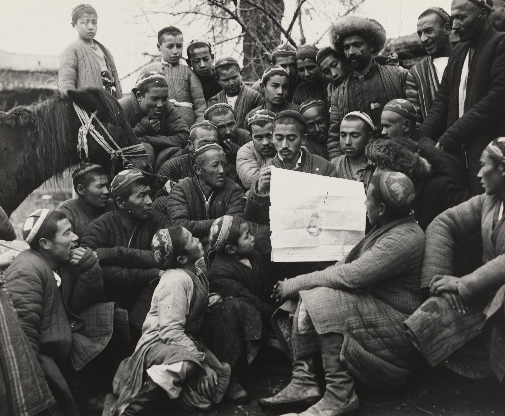 Georgi Zelma. Peasants Discussing News.  Literacy Campaign, Uzbekistan