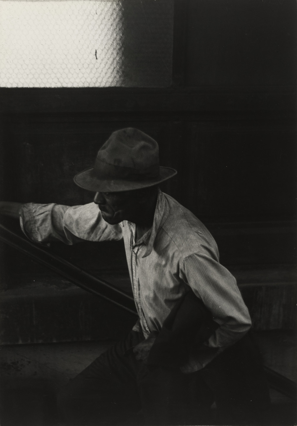 Roy DeCarava. Man Coming Up Subway Stairs. 1952