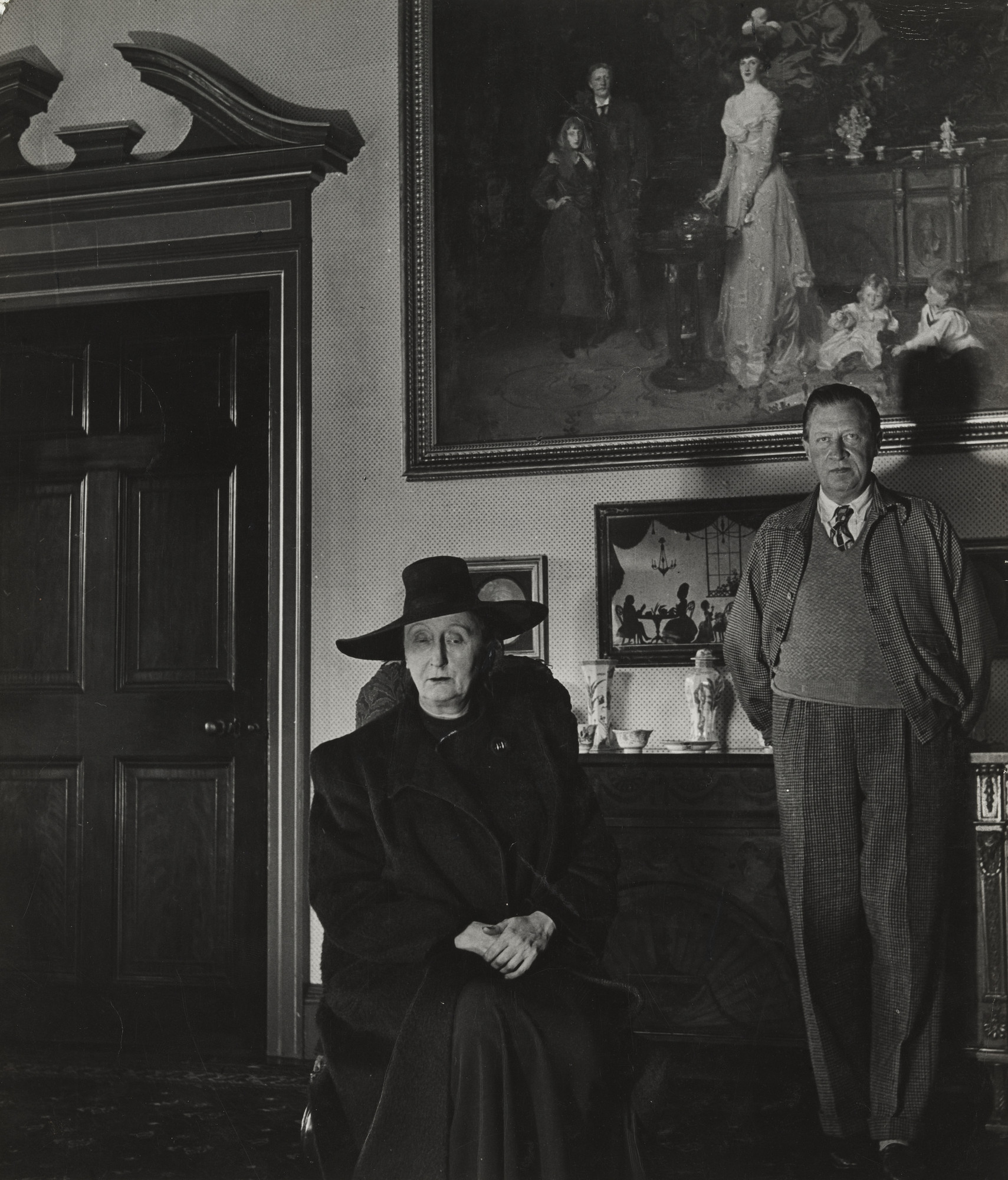 Bill Brandt. Edith and Osbert Sitwell beneath the Family Group by