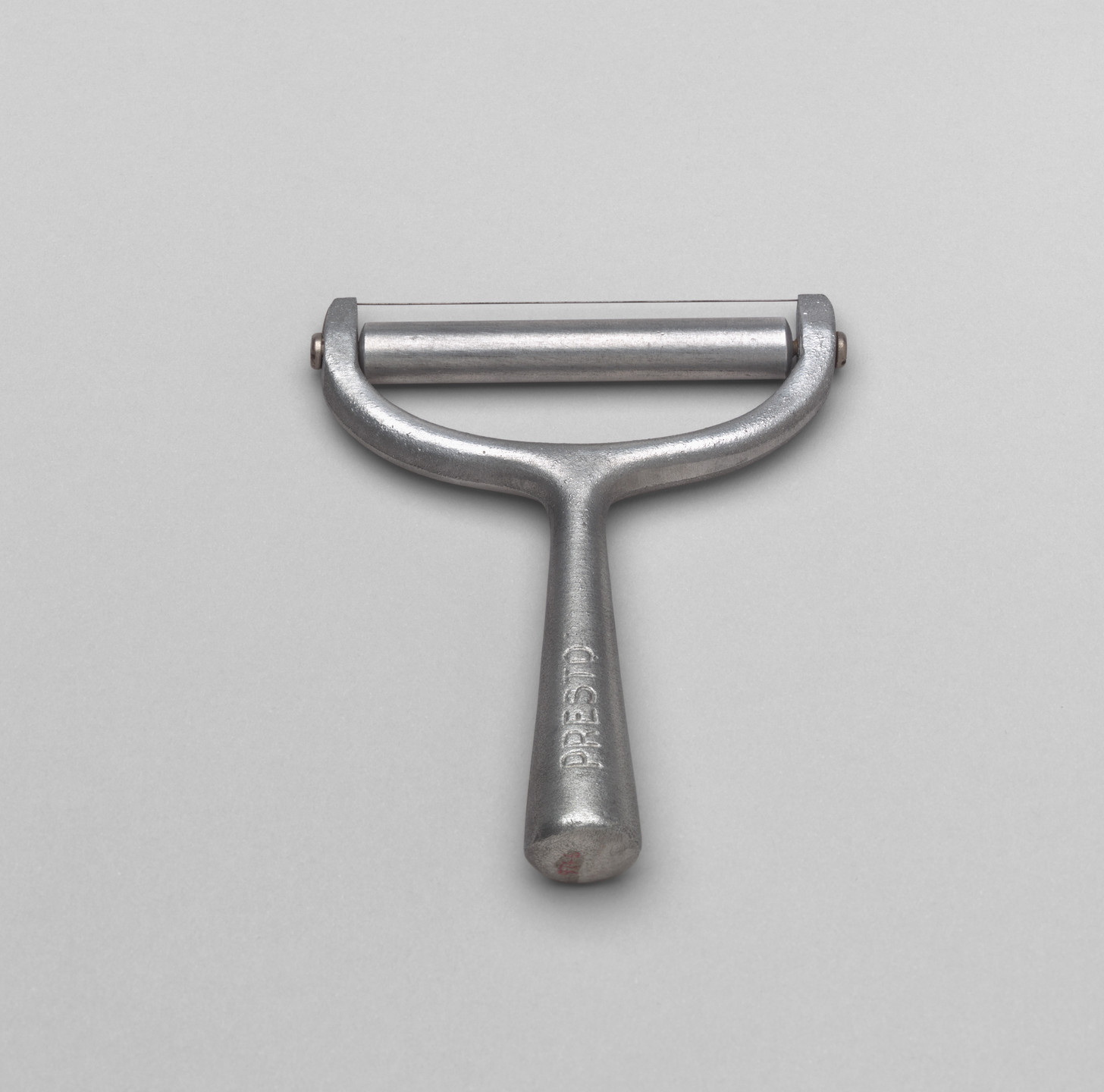 John R. Carroll. Presto Cheese Slicer. c. 1944