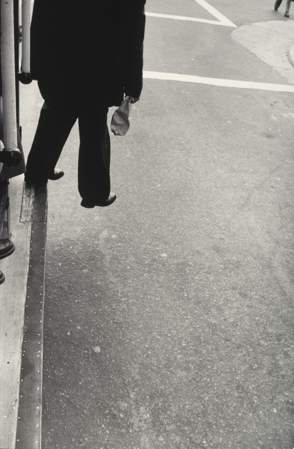 Dorothea Lange. Man Stepping from Cable Car, San Francisco. 1956