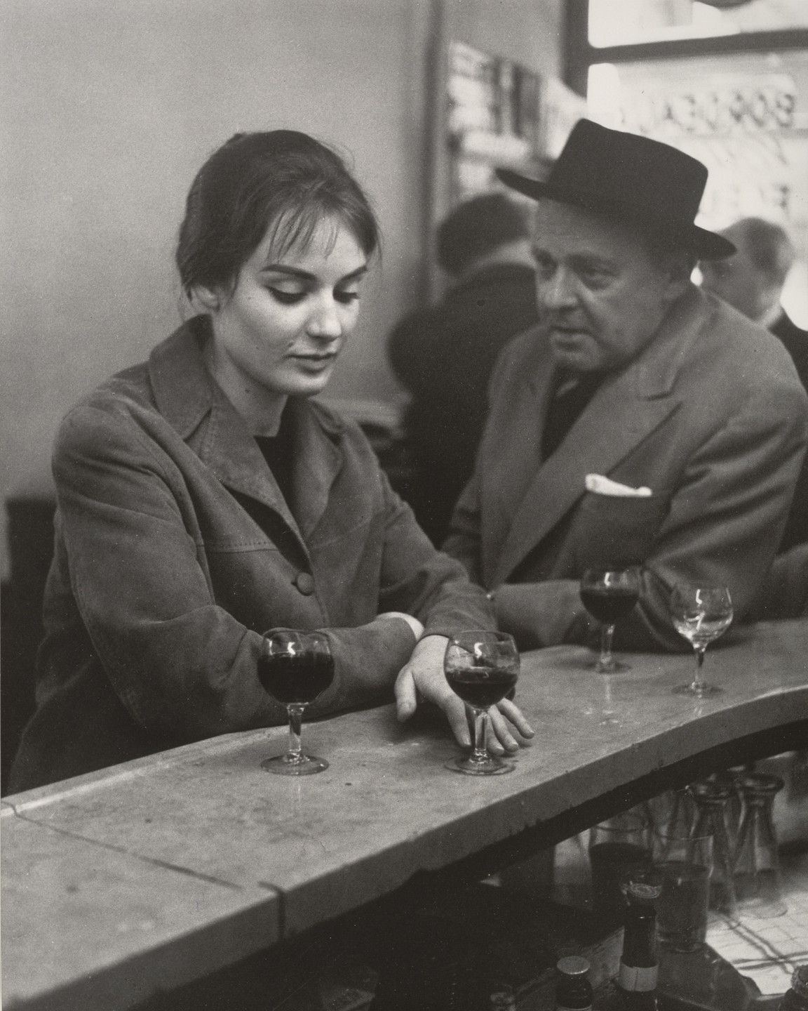 Robert Doisneau. At the Café, Chez Fraysse, Rue de Seine, Paris. 1958