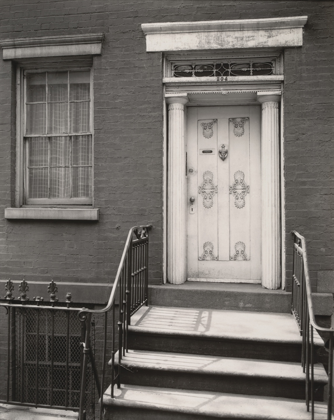 Berenice Abbott. Doorway, 204 West 13th Street, Manhattan. May 5, 1937