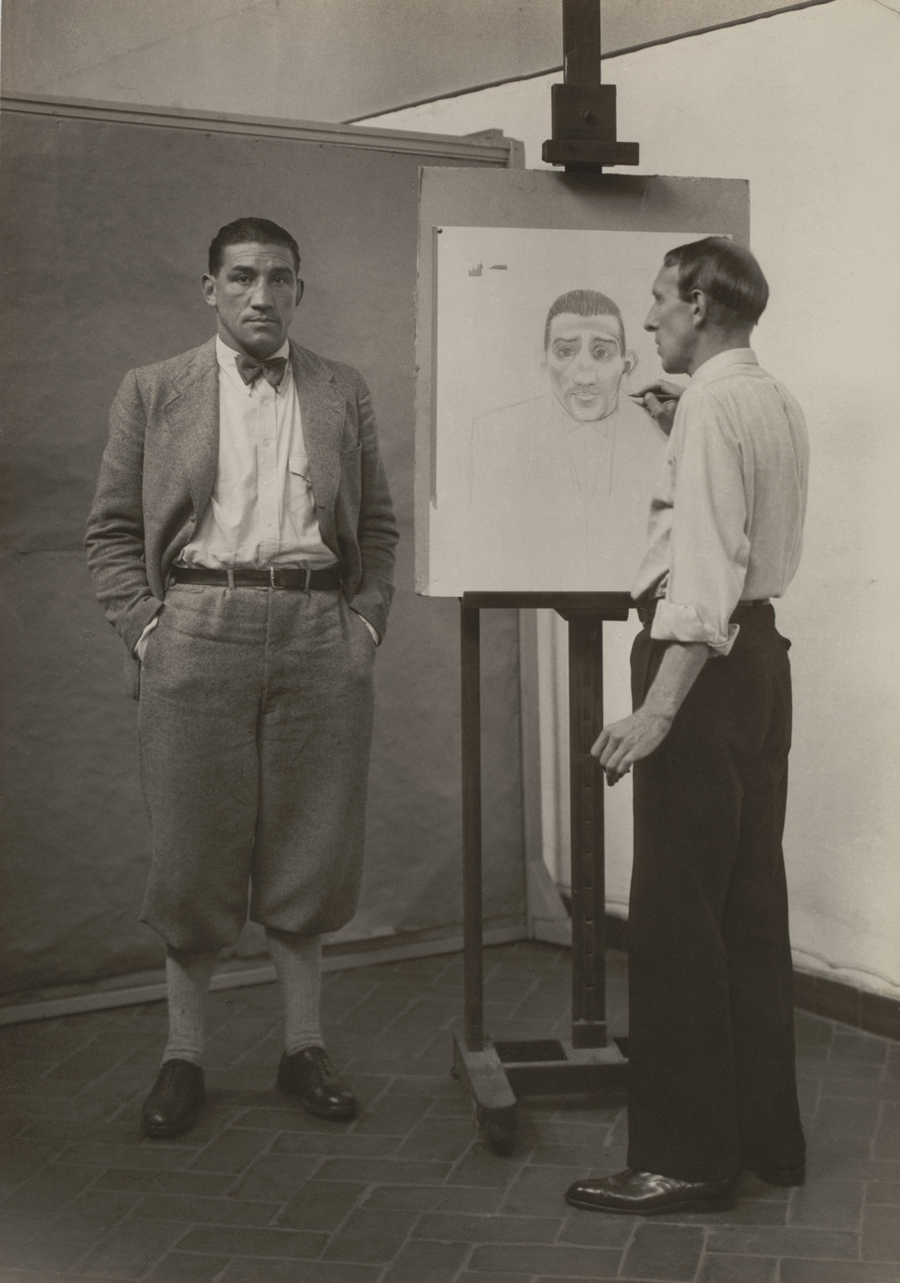 August Sander. The Painter Heinrich Hörle Drawing the Boxer Hein Domgören. 1927-31