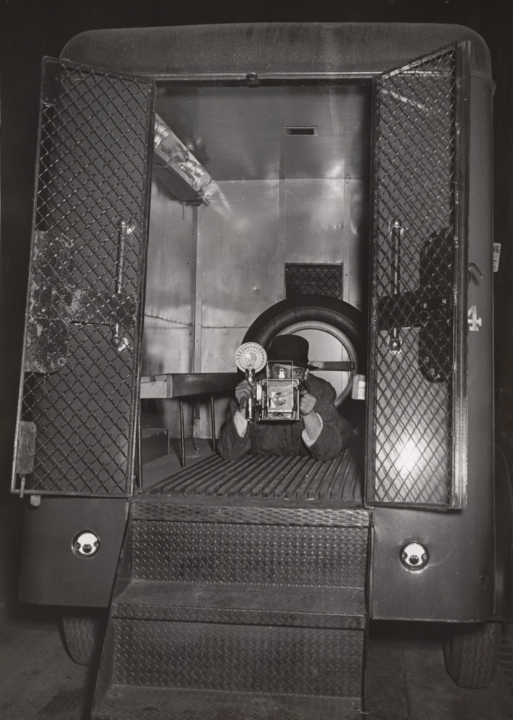 Self Portrait in Police Van