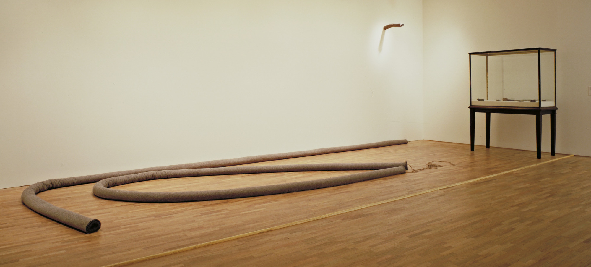 Joseph Beuys. OSTENDE on the beach or in the dunes a cube shaped house therein the Samurai Sword is a Blutwurst PLINTH