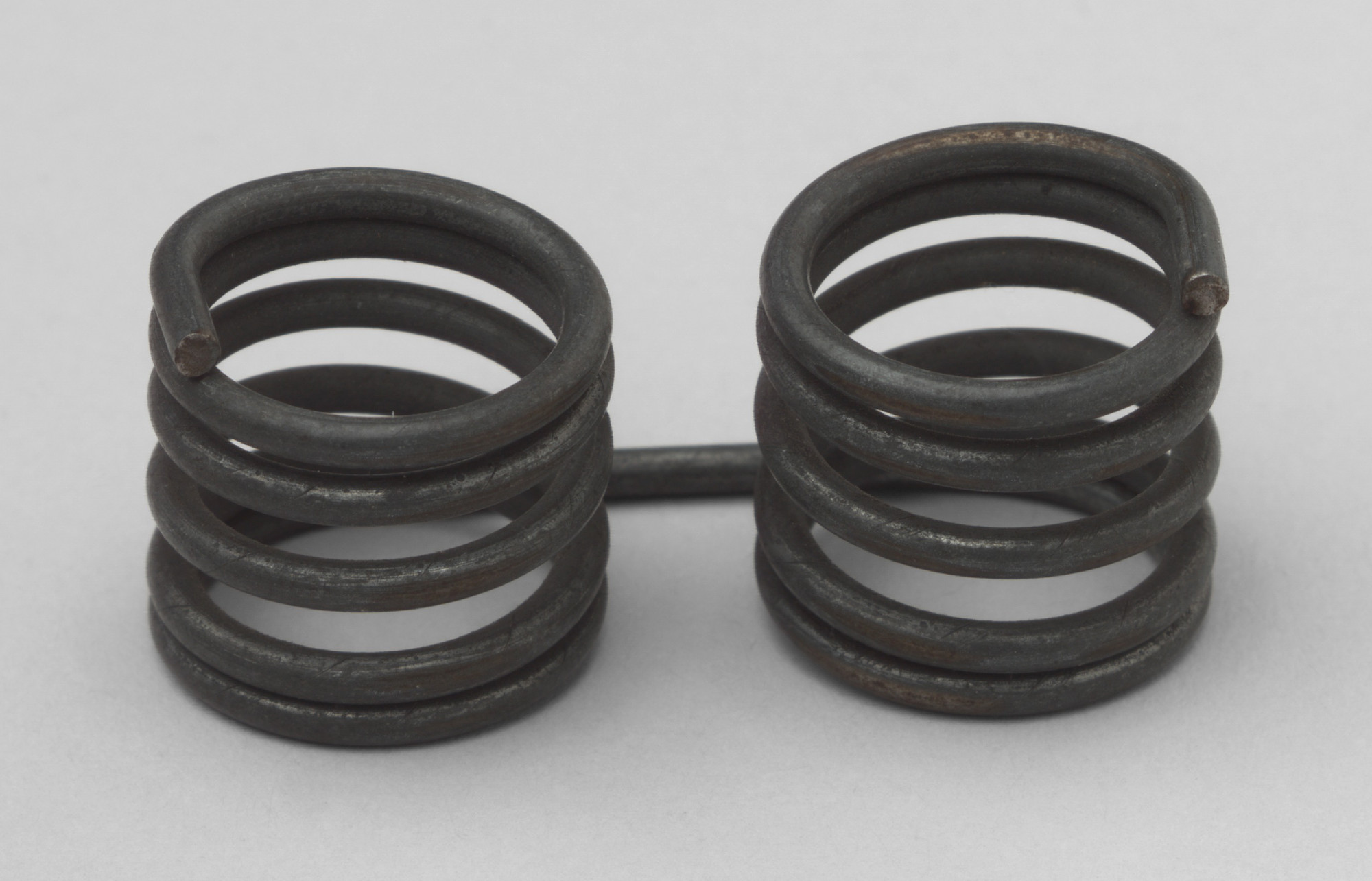 American Steel & Wire Co., Worcester, MA. Spectacle Spring. Before 1934