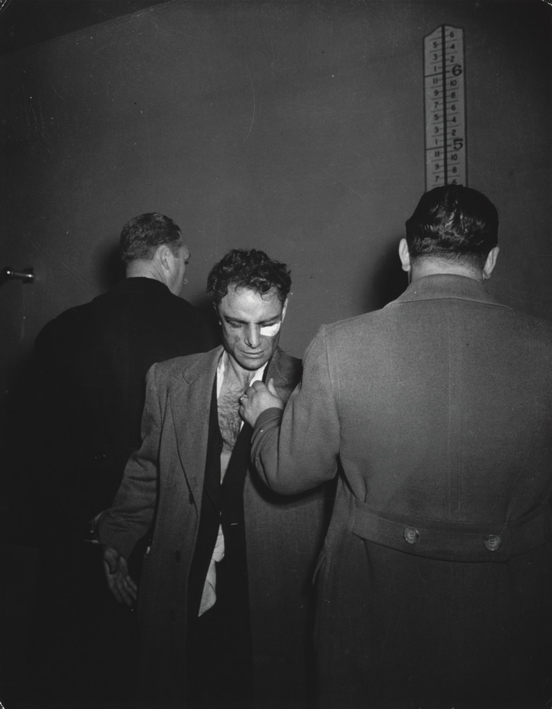 Booked on Suspicion of Killing a Policeman, Weegee, January 1941