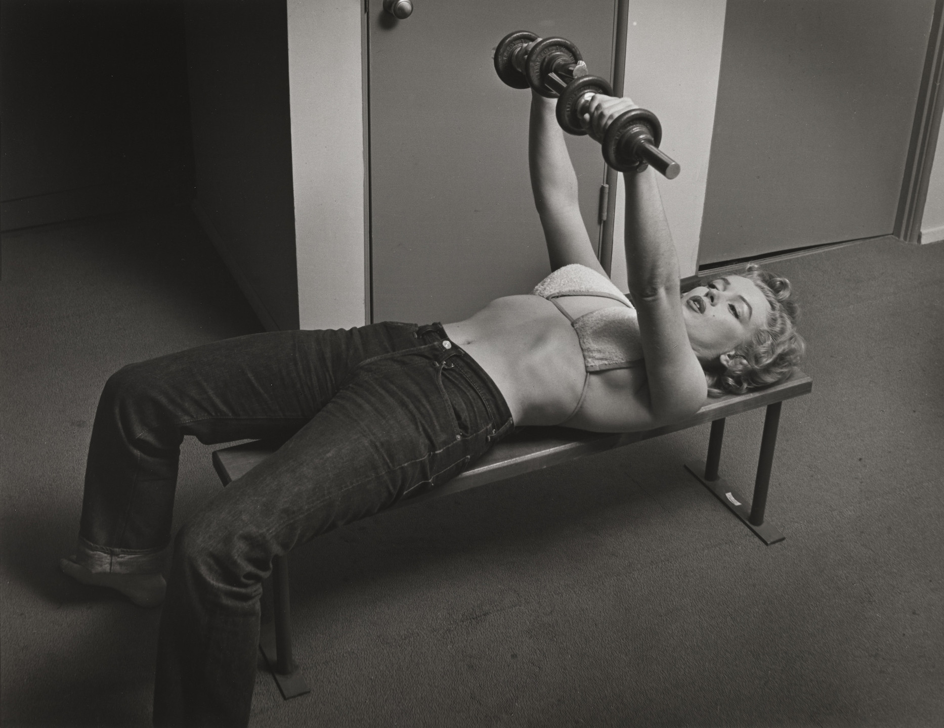 Philippe Halsman. Marilyn Monroe with Barbells. 1952