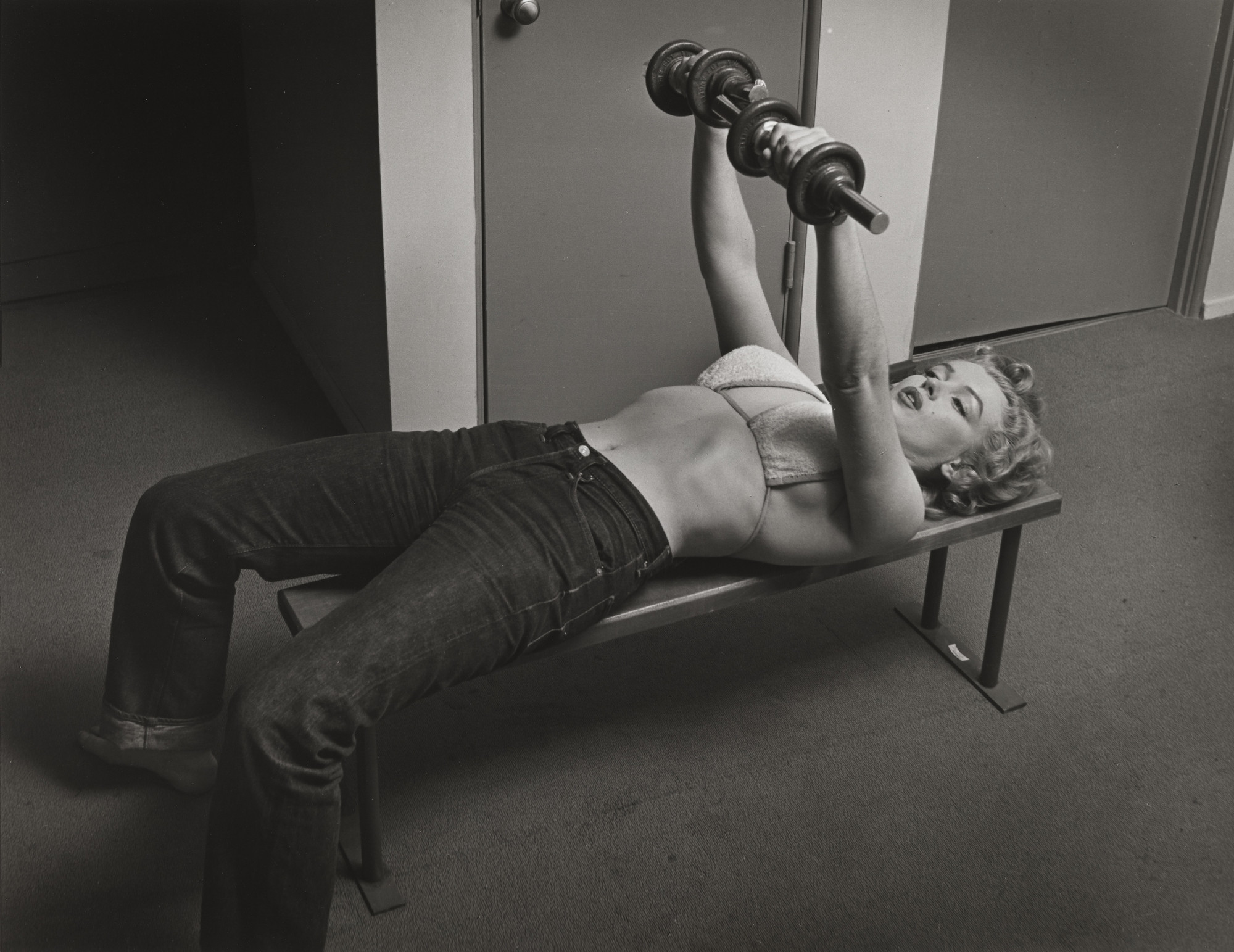 Philippe Halsman. Marilyn Monroe with Barbells