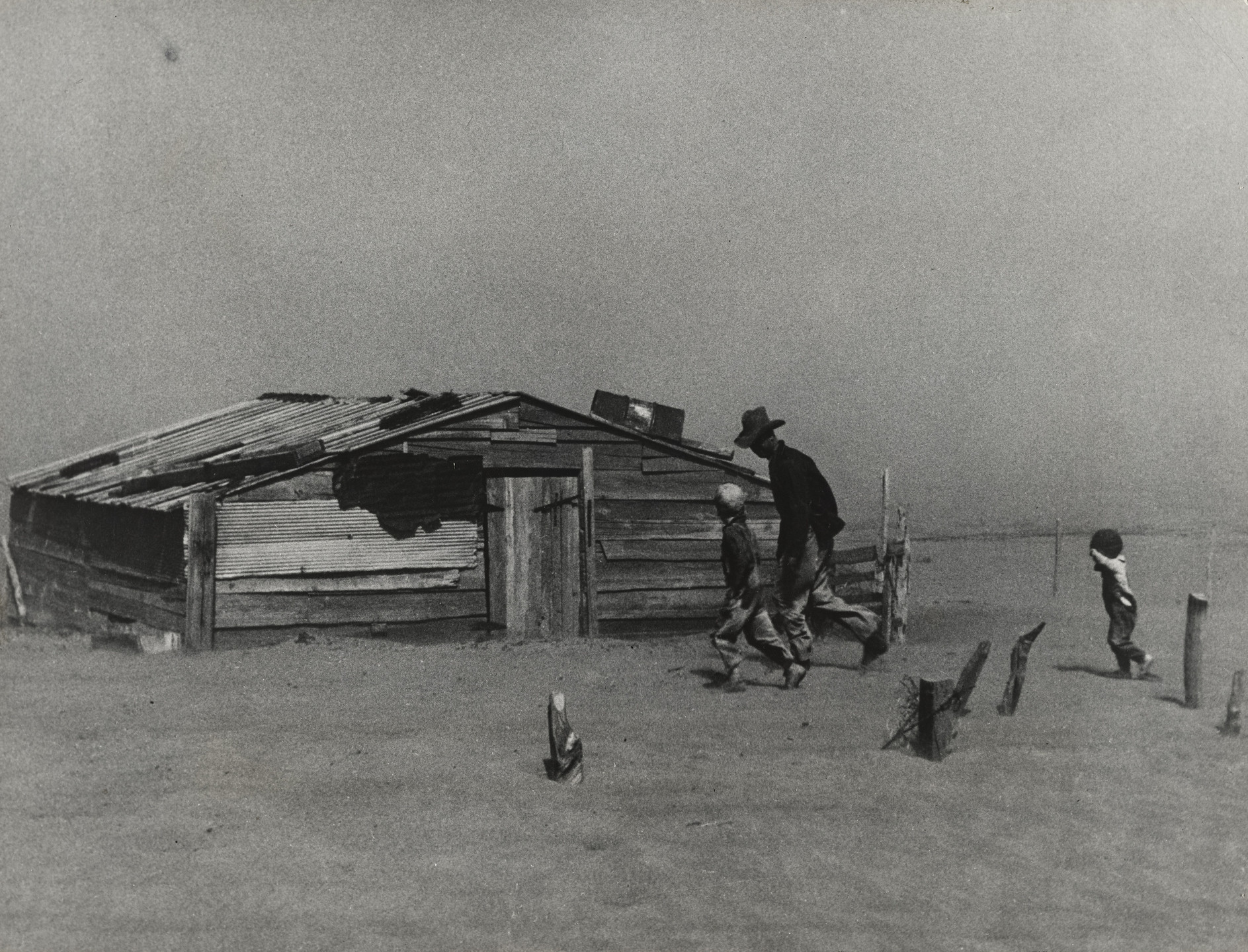 Arthur Rothstein. Farmer and Sons Walking in Dust Storm, Cimarron County, Oklahoma. April 1936
