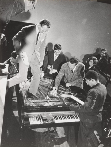 Philip Corner, Emmett Williams, George Maciunas, Benjamin Patterson, Dick Higgins, Alison Knowles. Philip Corner&#39;s Piano Activities, performed by Philip Corner, George Maciunas, Emmett Williams, Benjamin Patterson, Dick Higgins, and Alison Knowles during Fluxus Internationale Festpiele Neuester Musik, Hörsaal des Städtischen Museums, Wiesbaden, Germany, September 1, 1962. 1962