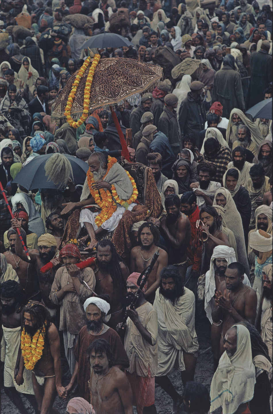 Raghubir Singh. Sadhu (Holy Man) in Palanquin, Kumb Mela, Ganges Bathing Fair, Allahabad, India. 1977