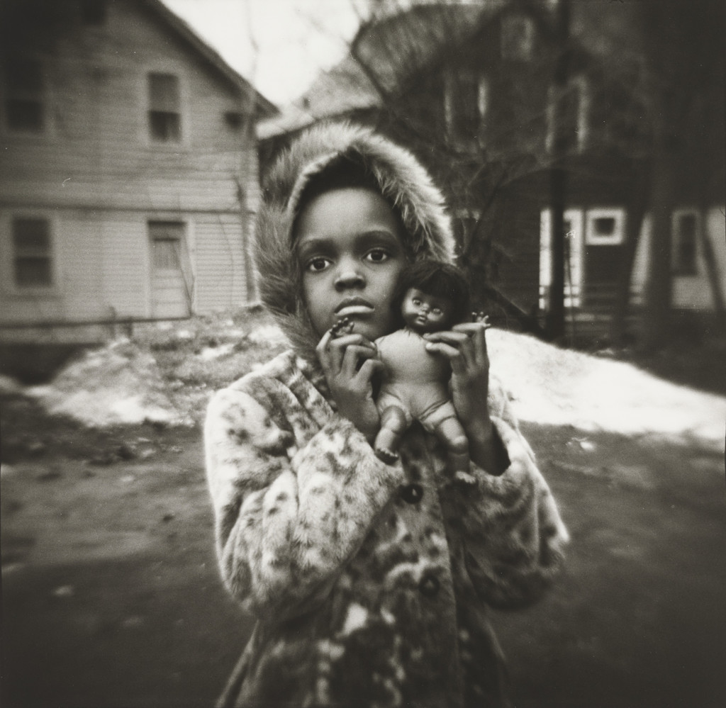 Mishael C. Holding Her New Black Doll