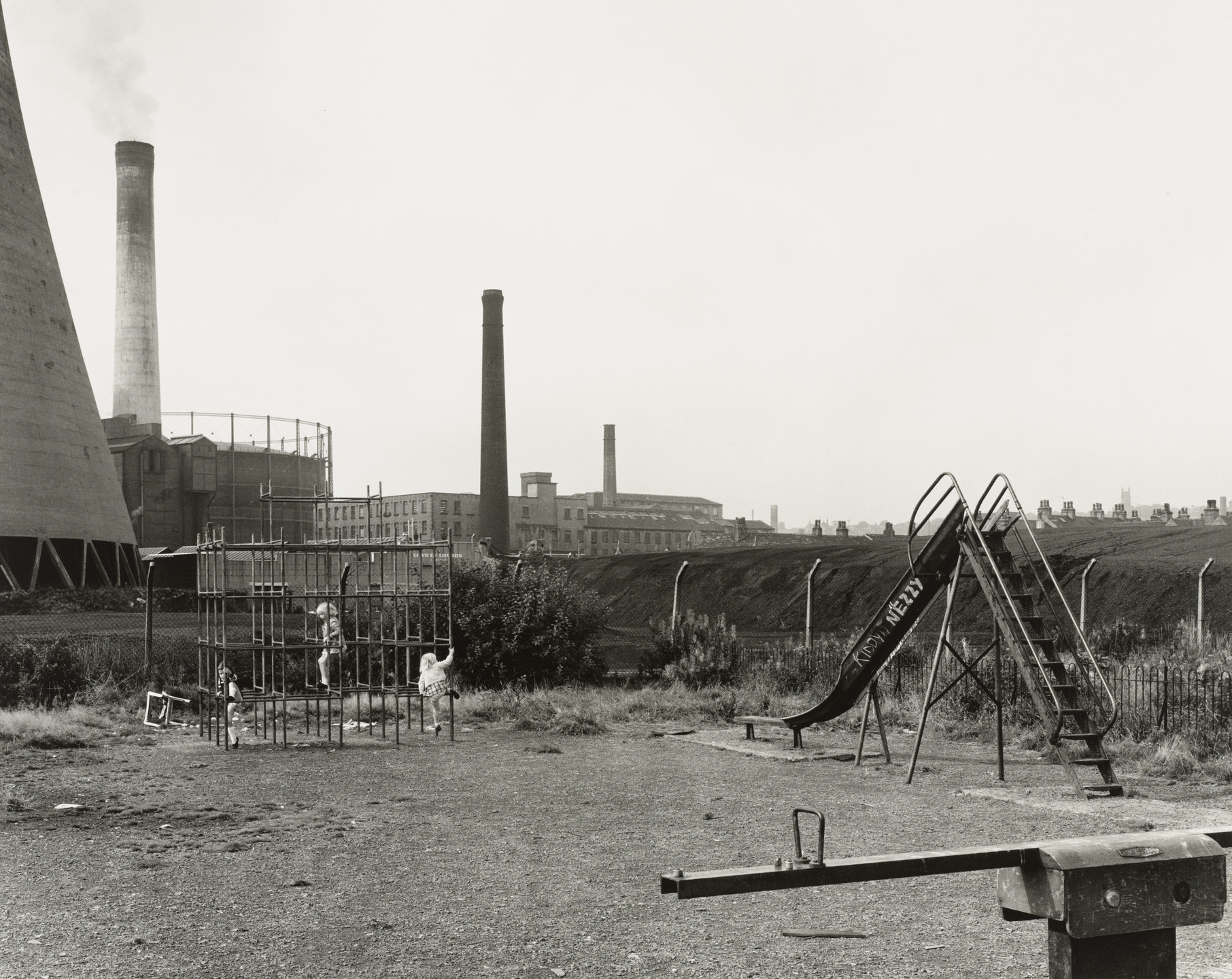 Chris Killip. Playground, Huddersfield, Yorkshire. 1974