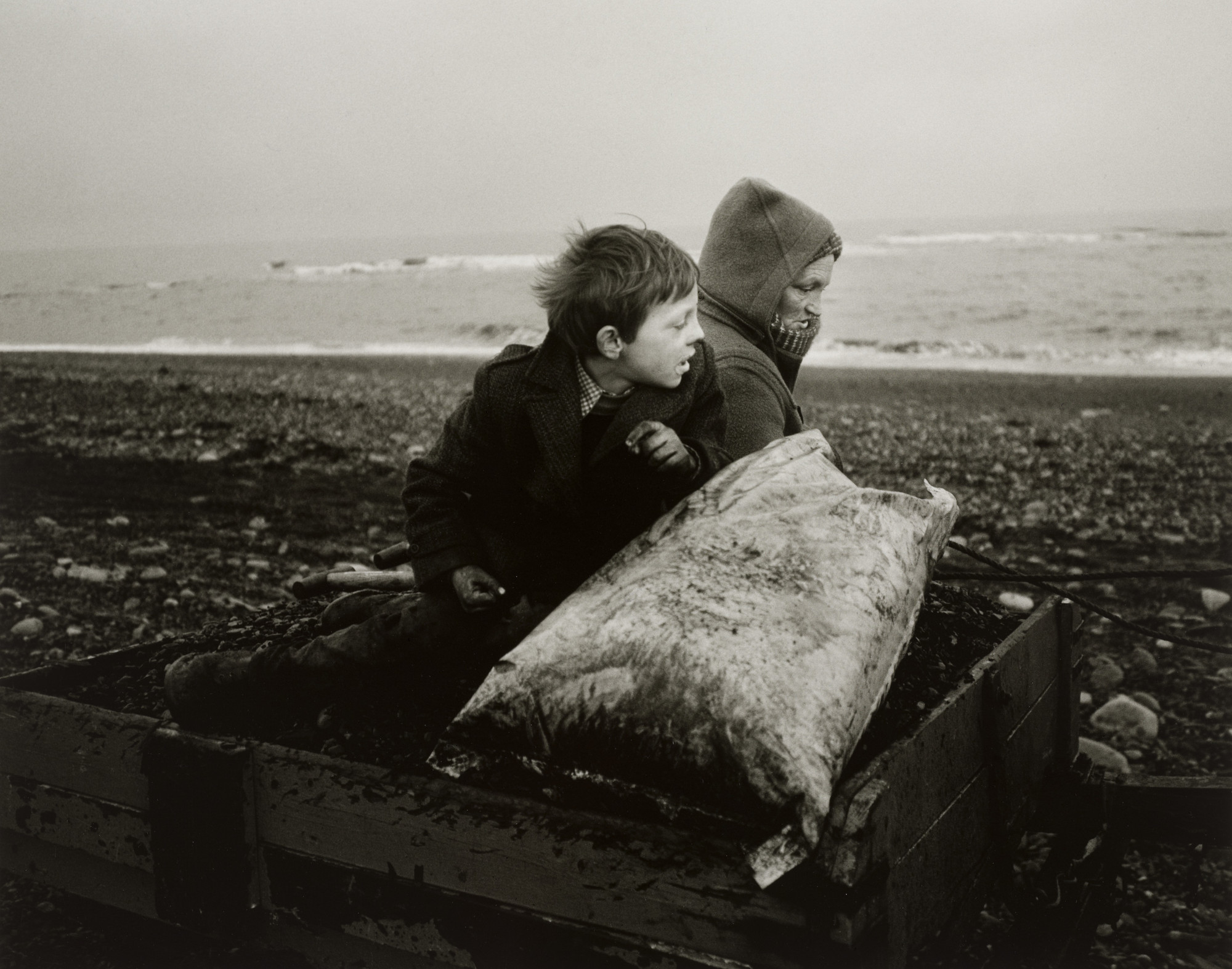 Chris Killip. Rocker and Rosie Going Home, Seacoal Beach, Lynemouth, Northumberland