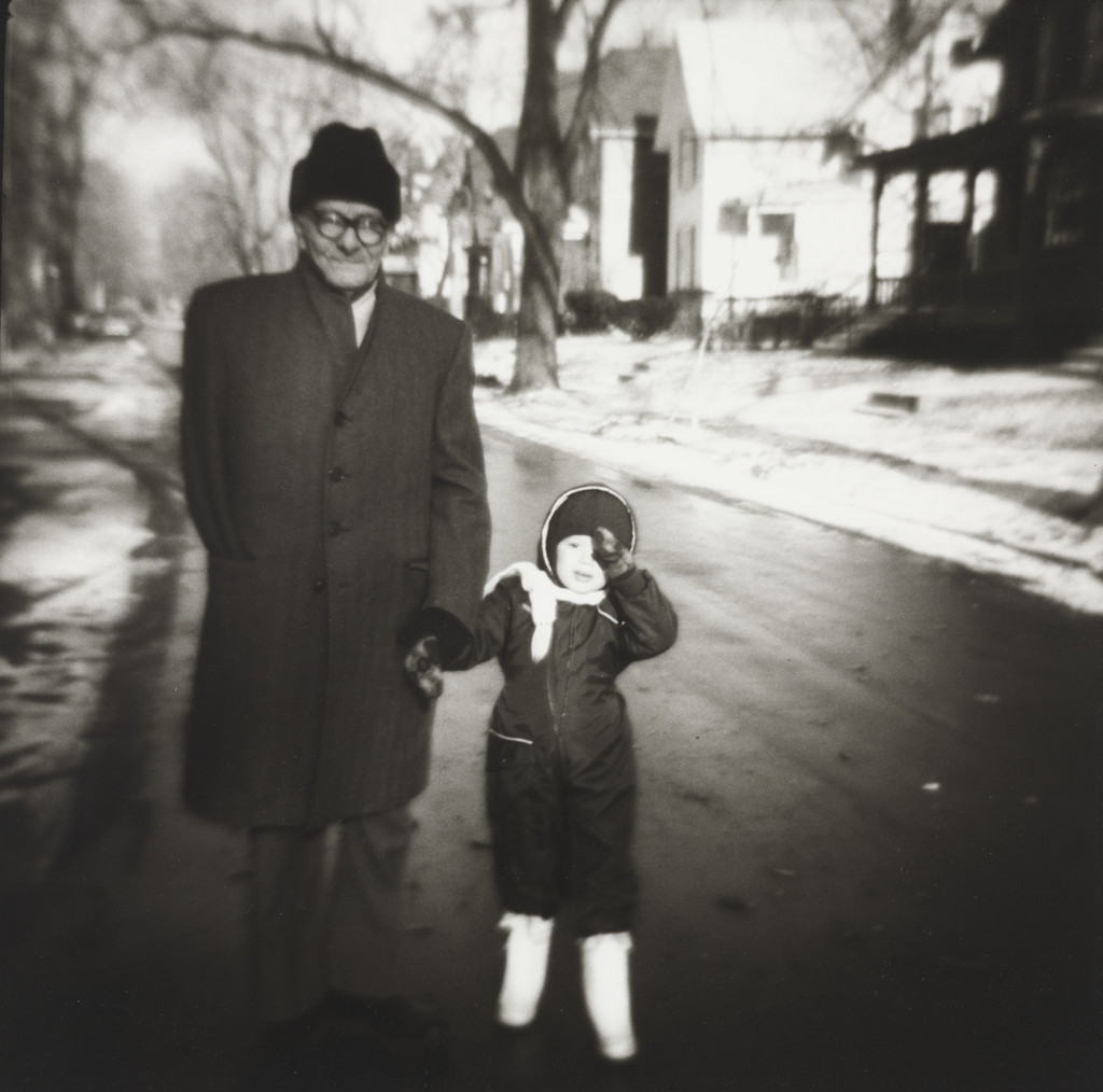 Russian Man with His Grandson on the First Sunny Day of a Long Winter
