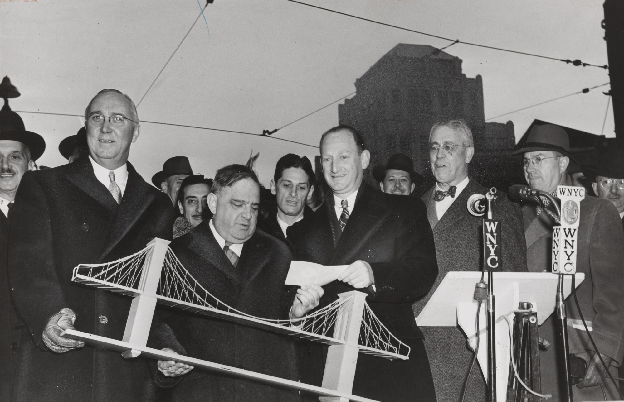The New York Times. "Mayor La Guardia Turning Over the Model of the Bridge to Jacob W. Schwab, Who Bought It By Purchasing $17,500,000 in Victory Bonds". November 1, 1945