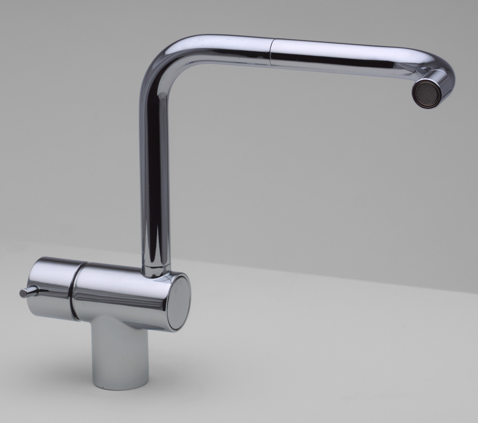 Arne Jacobsen. Vola Spout, Single control mixer for mounting on kitchen table. 1968