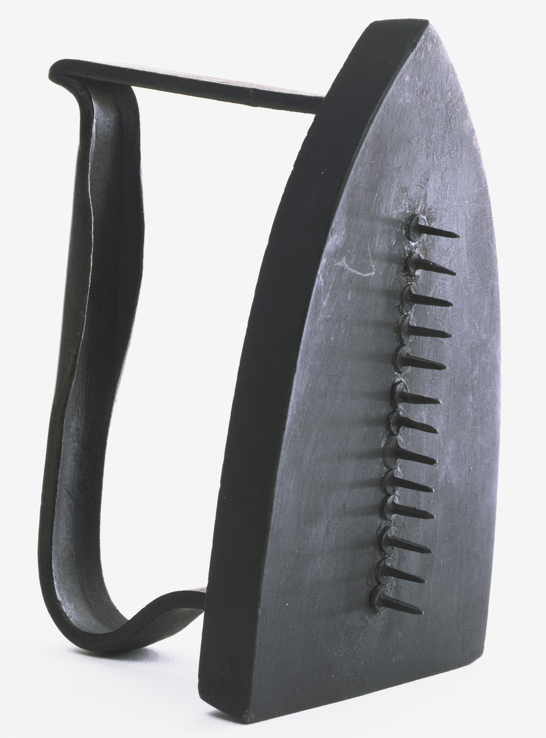Man Ray (Emmanuel Radnitzky). Gift. c. 1958 (replica of 1921 original)