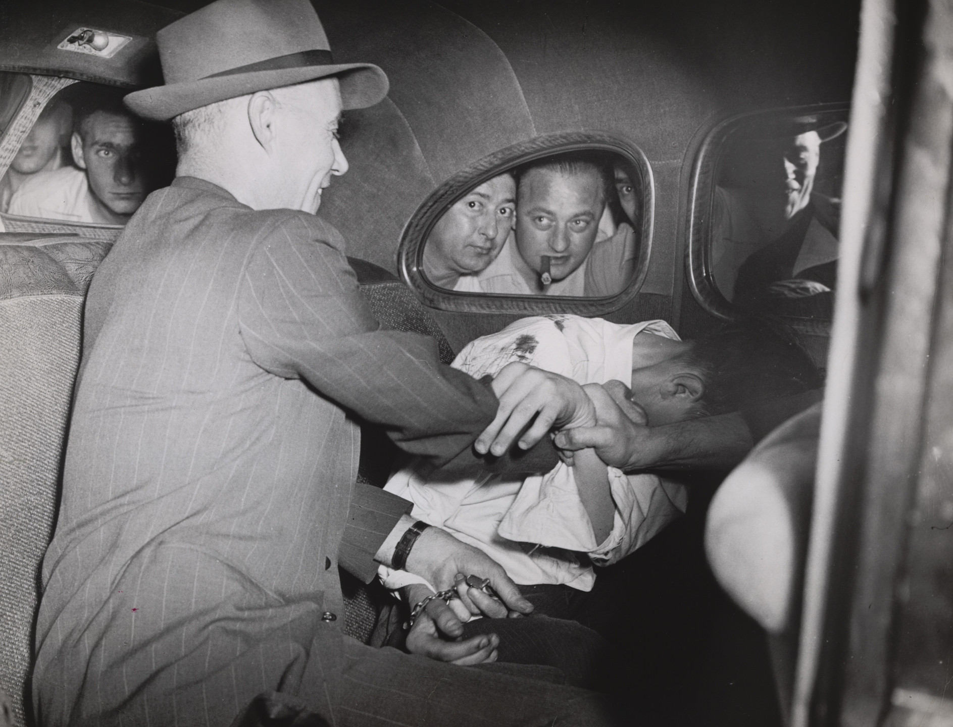 Weegee (Arthur Fellig). Harold Horn, Knocked Over Milk Wagon with Stolen Car. 1941
