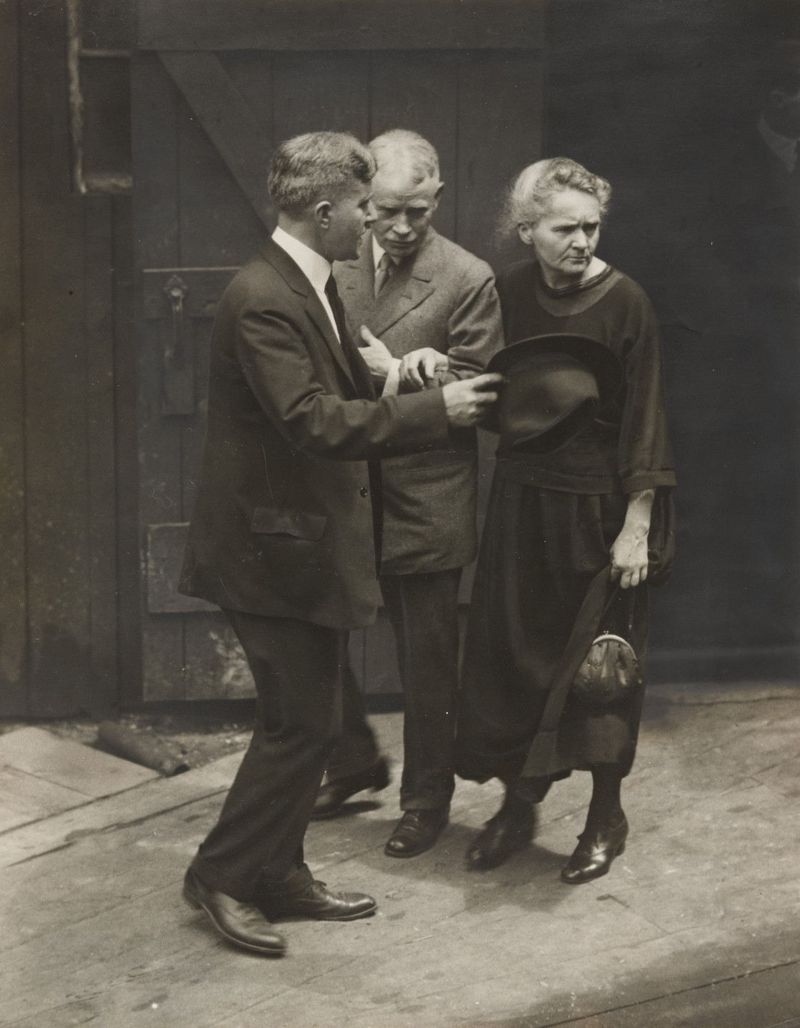 Norman M. Jeannero/Times World Wide Photos. "Madame Marie Curie, Co-discoverer of Radium, at the Radium Center of the World". 1921