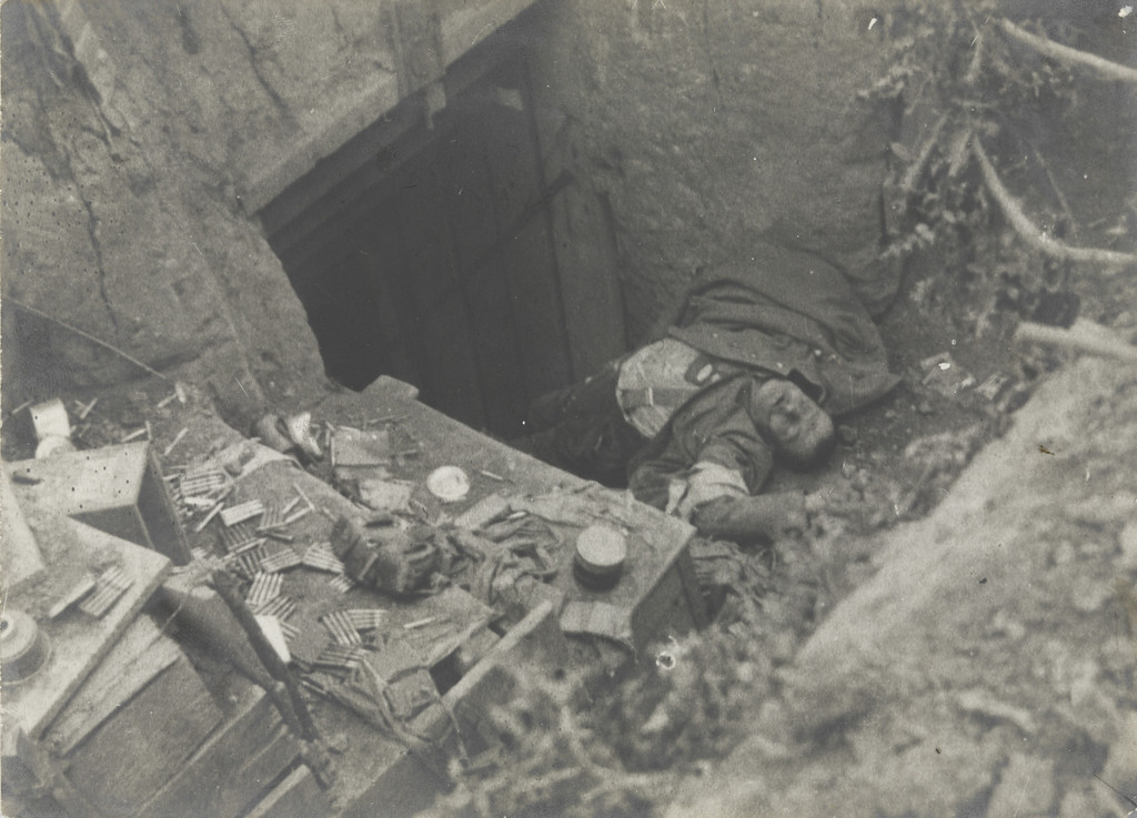 German Soldier Killed Near his Machine Gun at the Entrance to His Dugout on the Western Front