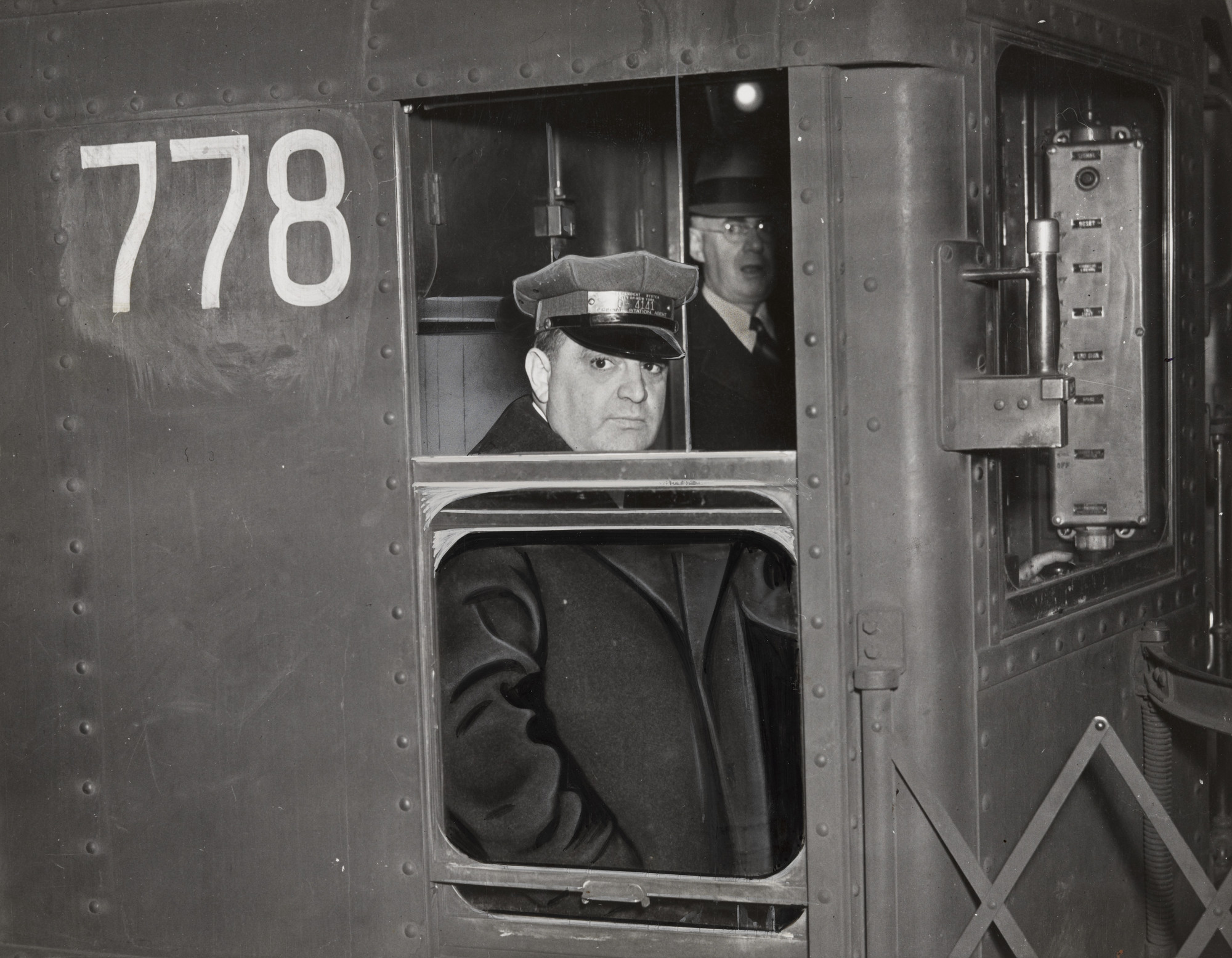 Times Wide World Photos. "The Mayor in the Motorman's Cab of the First Official Train"