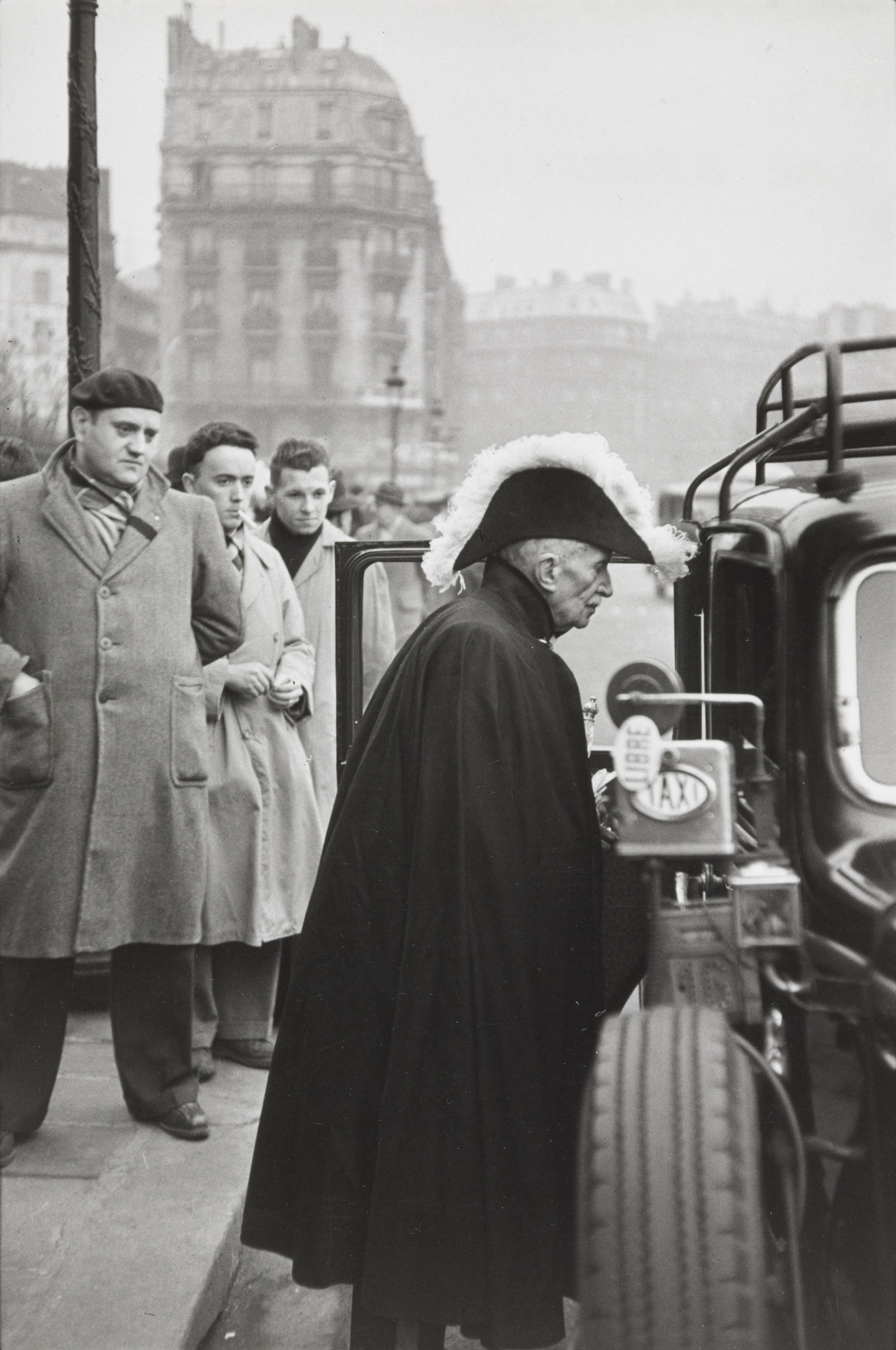 Henri Cartier-Bresson. A Member of the French Academy on his Way to a Ceremony at Notre Dame