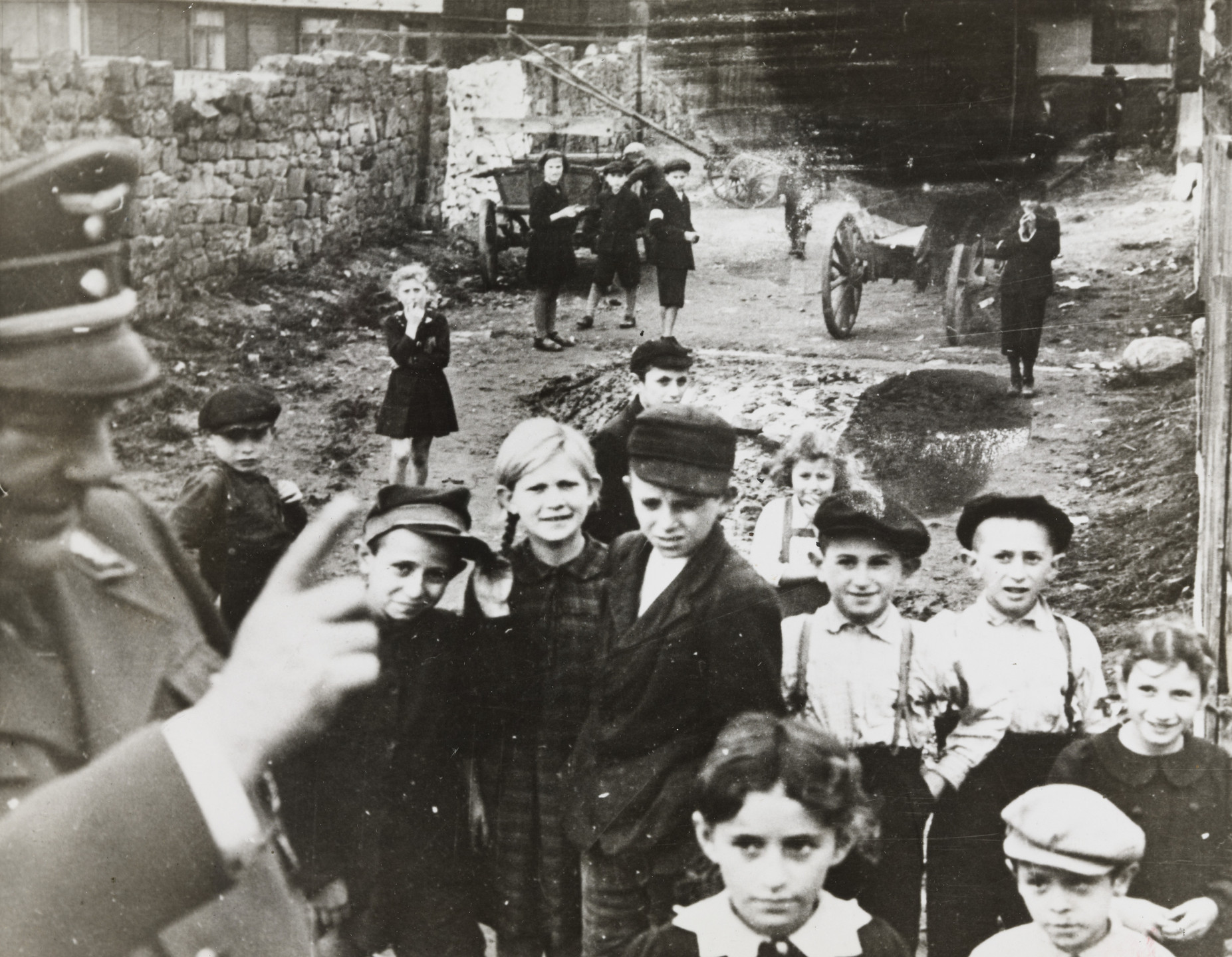 Associated Press. &#34;A German Officer Lectures Children in the Ghetto in Lublin&#34;. December 20, 1940