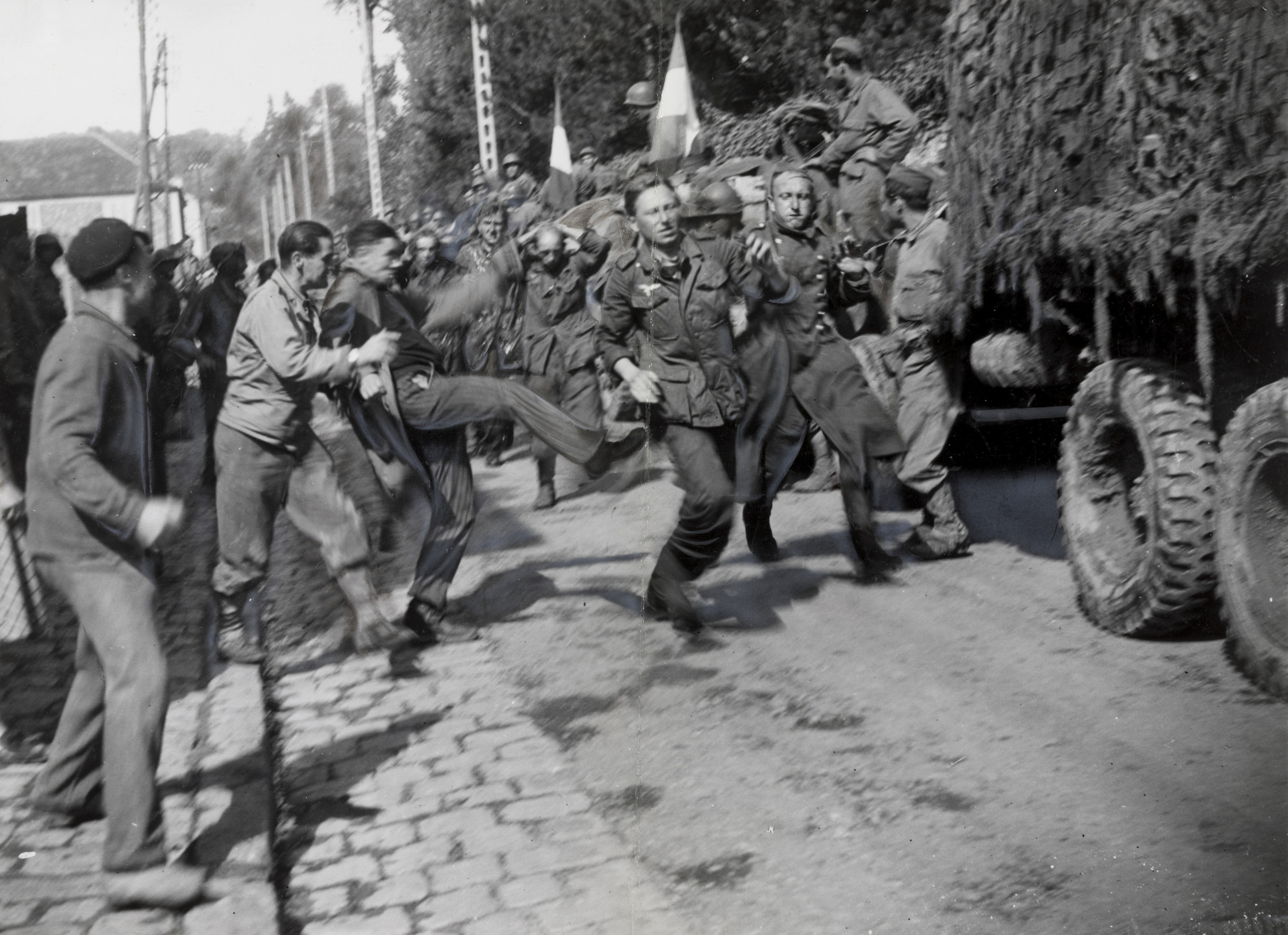 Dan Grossi/Associated Press. "How German Prisoners Were Received by French Patriots". August 24, 1944