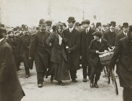 An Arrest When the Suffragettes Began a Riot in Parliament, London