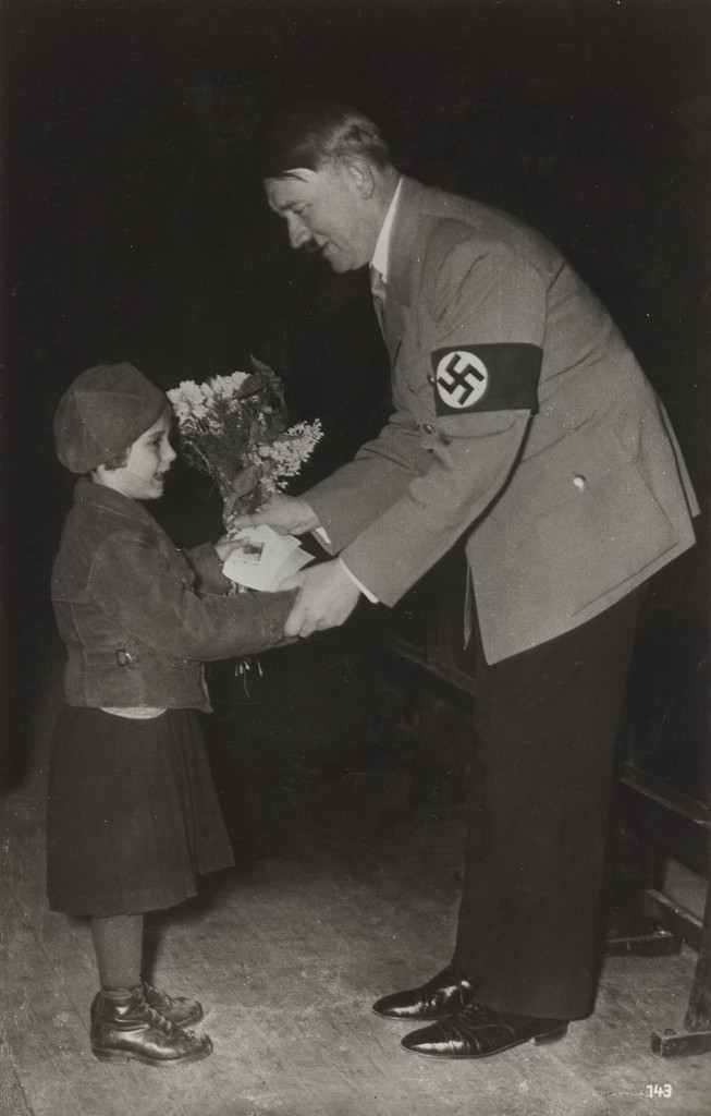 Girl Giving Hitler Flowers