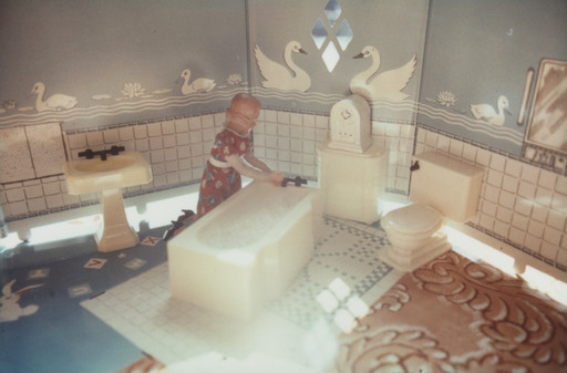First Bathroom/Woman Kneeling